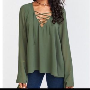 Olive green Show Me Your MuMu shirt.
